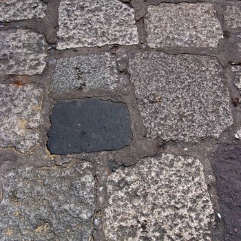 Old road paved with the cobble stones