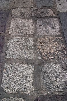 Old road paved with the cobble stones