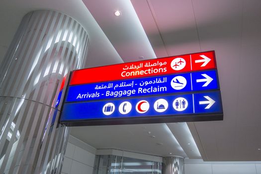 Airport direction sign in middle eastern country