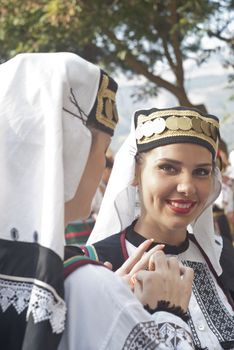 POLIZZI GENEROSA, SICILY-AUGUST 19: Beautiful Woman of Bosnia folk group at the International "Festival of hazelnuts",dance and parade through the city: August 19, 2012 in Polizzi Generosa,Sicily, Italy