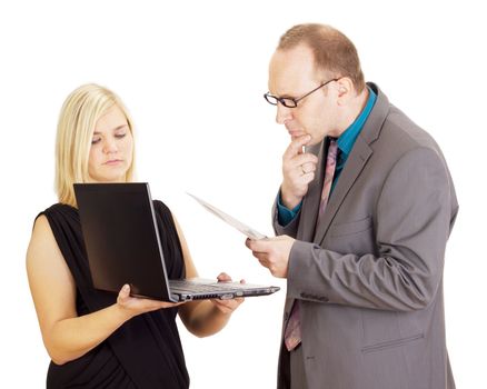 Two business people analysing some facts