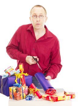 Person packaging some colorful gifts