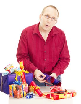 Person packaging some colorful gifts