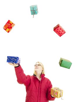 Woman juggling with some colorful gifts