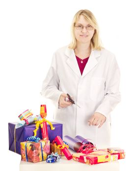 Person packaging some colorful gifts