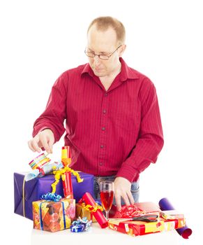 Person packaging some colorful gifts