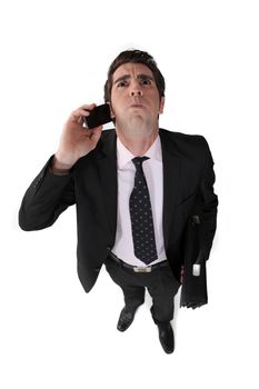 Businessman taking a bad phone call
