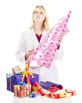 Person packaging some colorful gifts