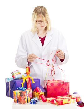 Person packaging some colorful gifts