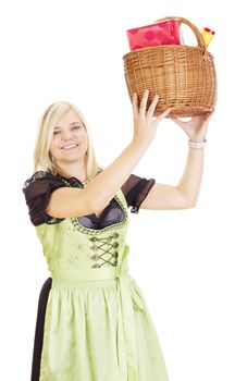 Young woman carries a basket with gifts