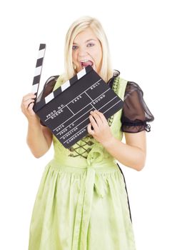 Woman in dirndl with clapperboard