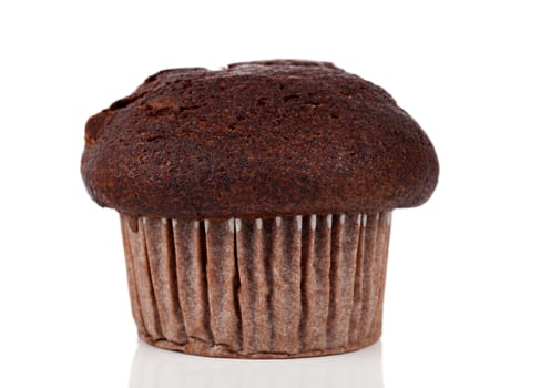 Close up of a fresh baked chocolate muffin against a white background
