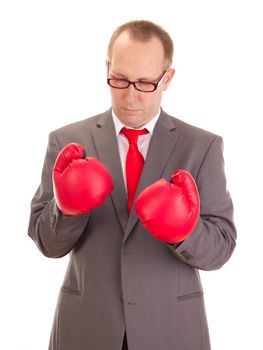 Business person with boxing gloves