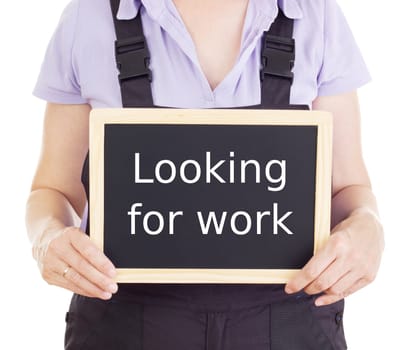 Craftsperson with blackboard: looking for work