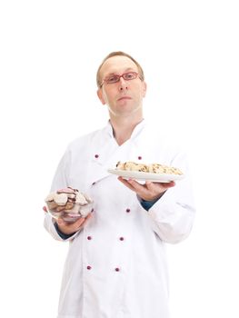 Baker with gingerbreads and stollen