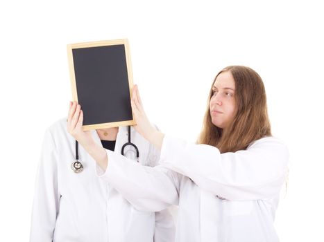 Two female medical doctors with blackboard