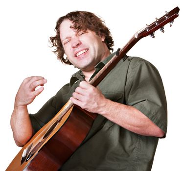 Excited guitar player strumming his instrument on white background