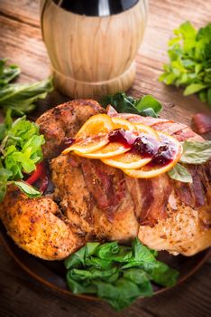 baked turkey with chestnut filling and orange-selective focus