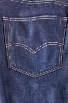 View of a back pocket of jeans trousers