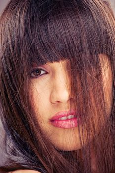 Pretty brunette woman with long hair