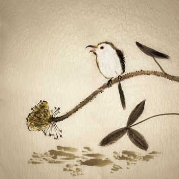 Chinese traditional ink painting with birds and flowers on yellow old canvas.