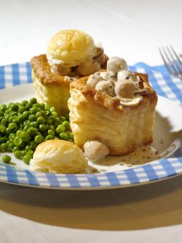 Photo of Pastetli, a traditional Swiss vol-au-vent meal made with a white wine sauce and a mushroom and meat filling.