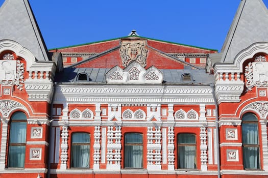 Town landscape with historic theater and blue sky