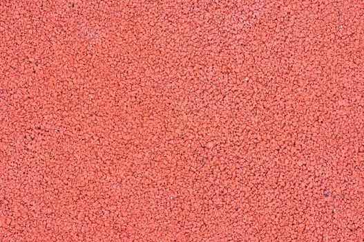 Texture of color rubber floor on playground. ( Ethylene Propylene Diene Monomeror EPDM)
