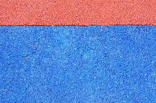 Texture of color rubber floor on playground. ( Ethylene Propylene Diene Monomeror EPDM)