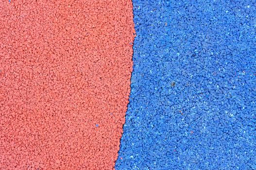 Texture of color rubber floor on playground. ( Ethylene Propylene Diene Monomeror EPDM)