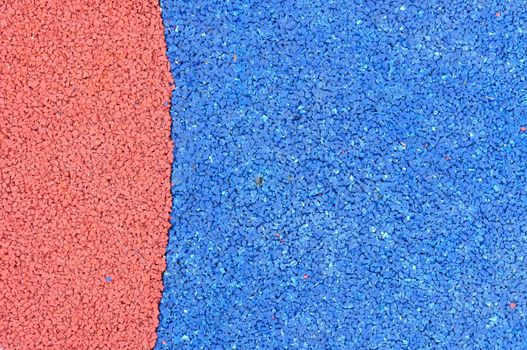 Texture of color rubber floor on playground. ( Ethylene Propylene Diene Monomeror EPDM)