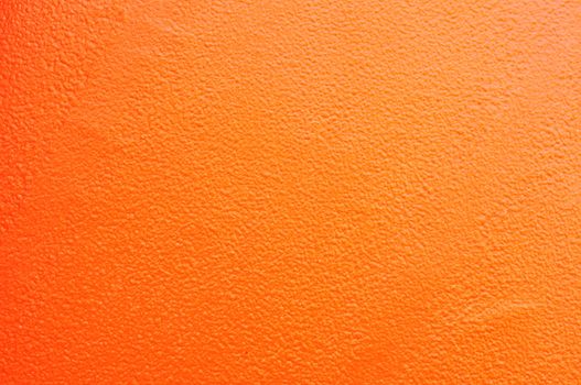 orange colored bumpy plastic texture 