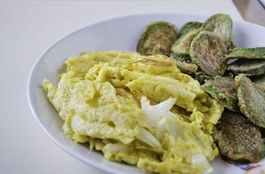 Omelet with fried eggplants vegetables