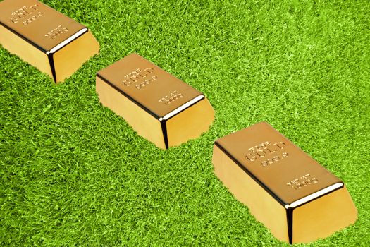 Gold bars in green grass