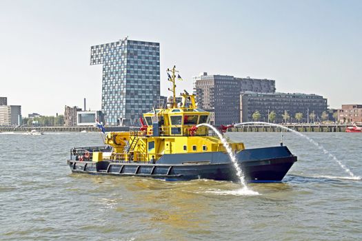 Fireboat in the harbor from Rotteram in the Netherlands