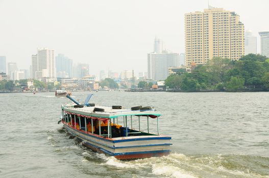Boat in the river of Chao Praya in Bangkok, Thailand.
