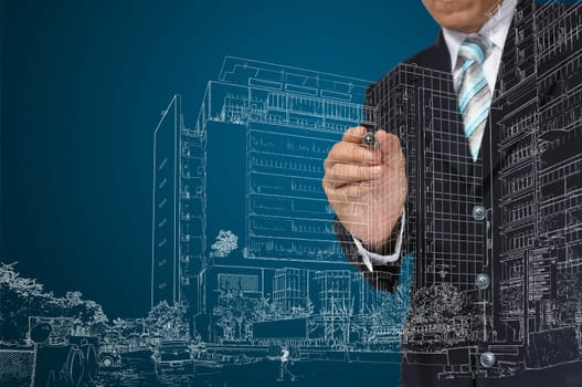 Business Man or architect draw building and cityscape