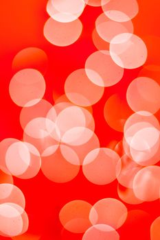 Abstract background. Blurred colorful circles bokeh orange toned