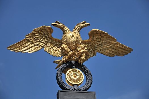 Russian double headed eagle on sky background
