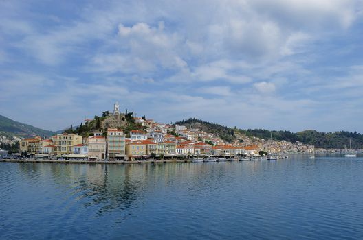 The city of Poros in Greece seen from the Peloponnese peninsula.