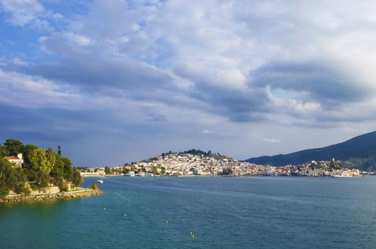 The city of Poros in Greece as seen when approaching with the ferry from Athens.