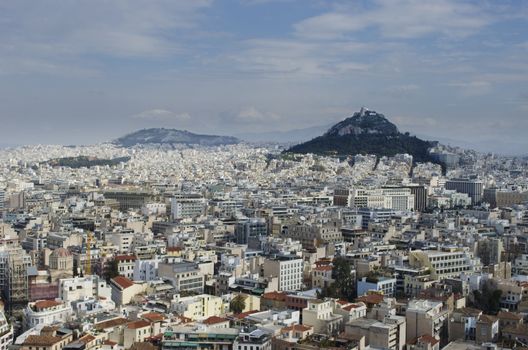 City view of Athens from the acropolis. The Lycabettus can be seen as a prominent feature.