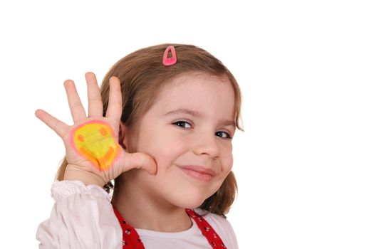 beautiful little girl with smiley on hand