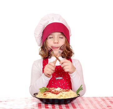 hungry little girl cook eat spaghetti