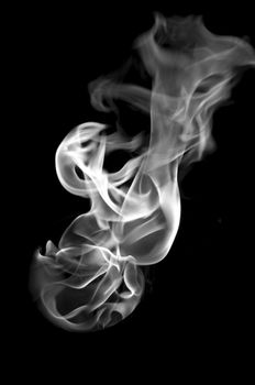 white fire with a black background, abstract background.