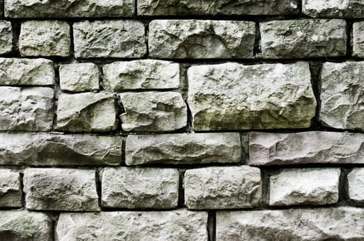 High contrast image of an old stone wall.