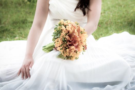 Bride holding a wedding bouquet