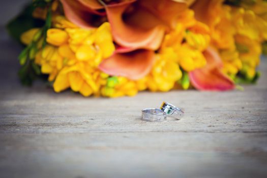 Wedding rings and wedding bouquet 