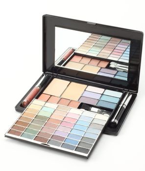 Multi colored make-up palette on white background
