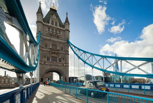 The famous Tower Bridge in London, UK. Sunny day. Photograph taken with the tilt-shift lens, vertical lines of architecture preserved